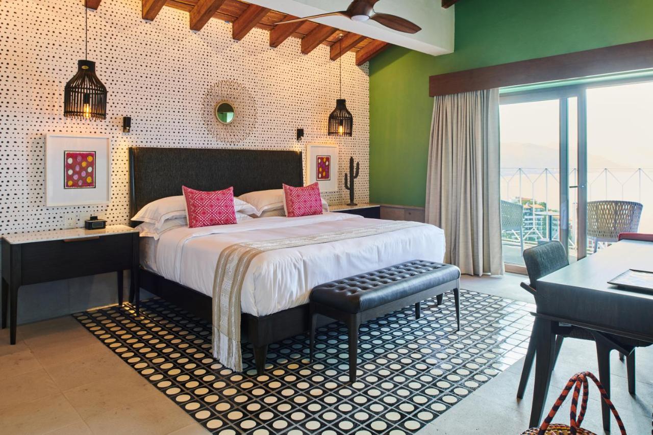 Hotel Luxury Patio Azul (Adults Only) ปูแอร์โตบาญาร์ตา ภายนอก รูปภาพ A bedroom at the hotel