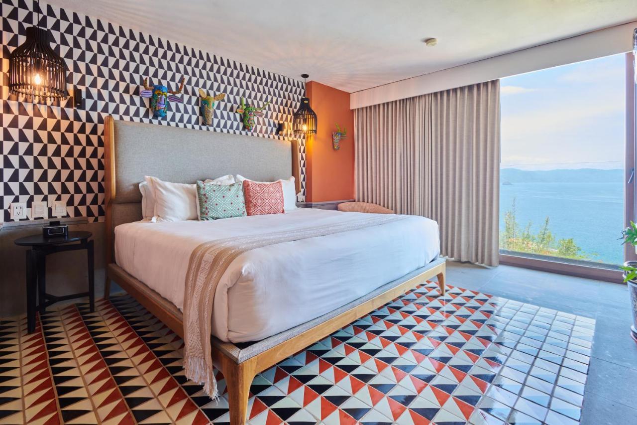 Hotel Luxury Patio Azul (Adults Only) ปูแอร์โตบาญาร์ตา ภายนอก รูปภาพ A bedroom at the hotel