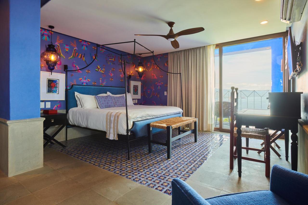 Hotel Luxury Patio Azul (Adults Only) ปูแอร์โตบาญาร์ตา ภายนอก รูปภาพ A bedroom at the hotel