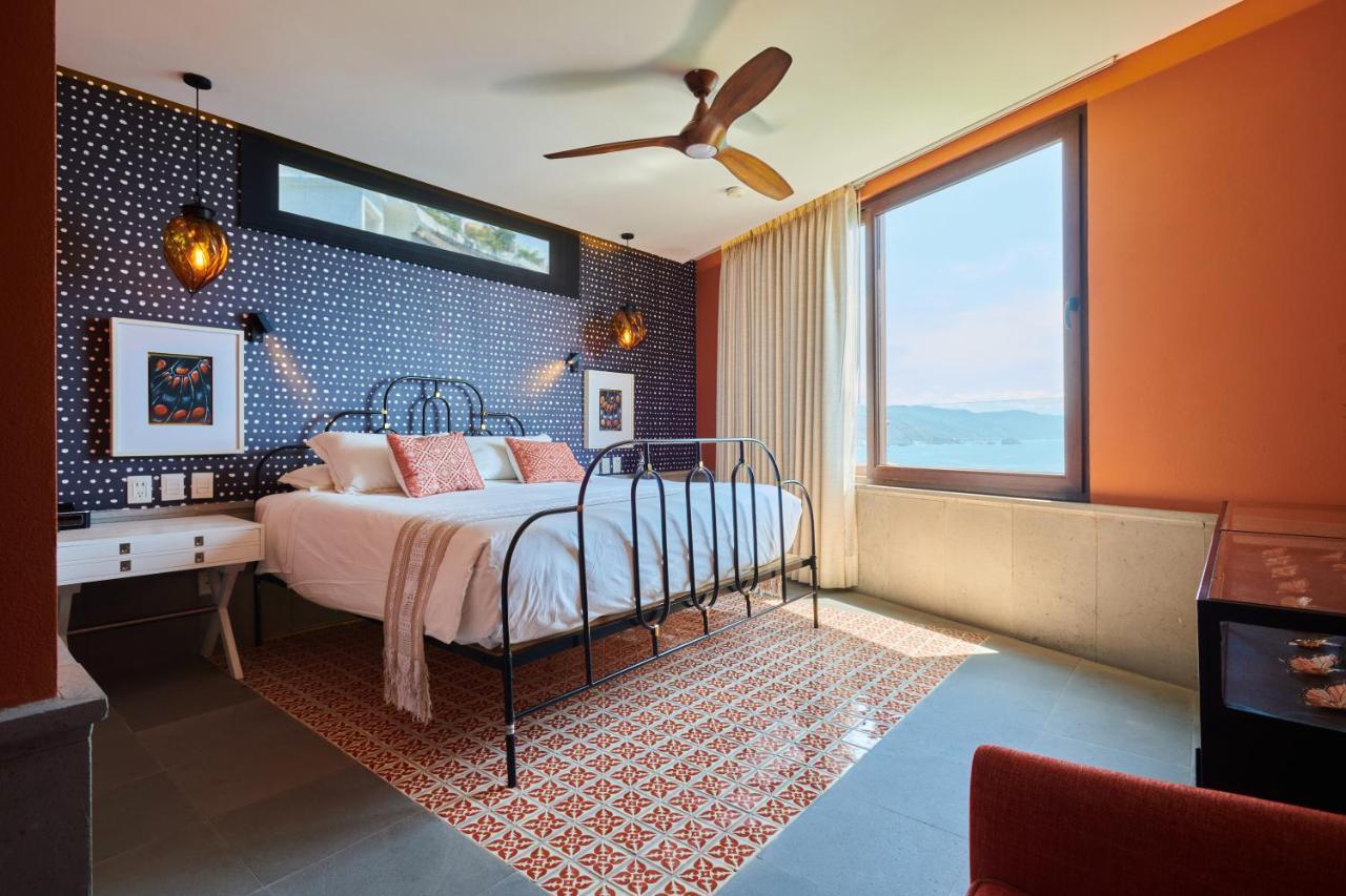Hotel Luxury Patio Azul (Adults Only) ปูแอร์โตบาญาร์ตา ภายนอก รูปภาพ A bedroom at the hotel