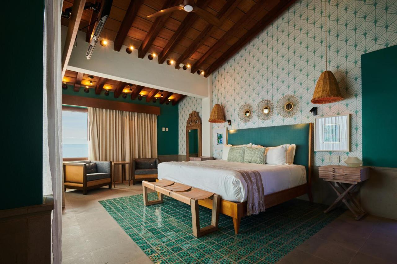 Hotel Luxury Patio Azul (Adults Only) ปูแอร์โตบาญาร์ตา ภายนอก รูปภาพ A bedroom at the hotel
