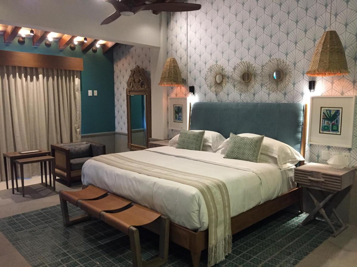 Hotel Luxury Patio Azul (Adults Only) ปูแอร์โตบาญาร์ตา ภายนอก รูปภาพ A bedroom at the hotel
