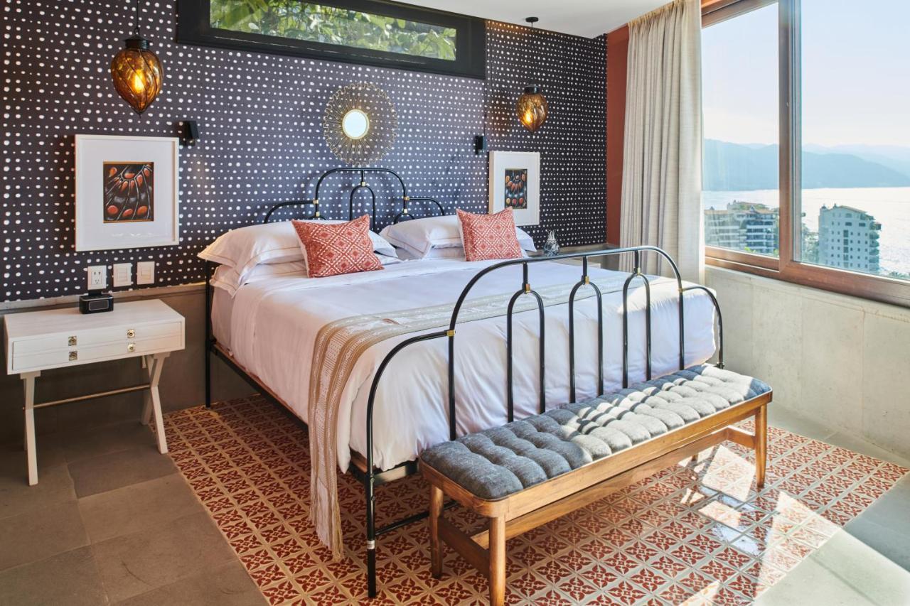 Hotel Luxury Patio Azul (Adults Only) ปูแอร์โตบาญาร์ตา ภายนอก รูปภาพ A bedroom at the hotel