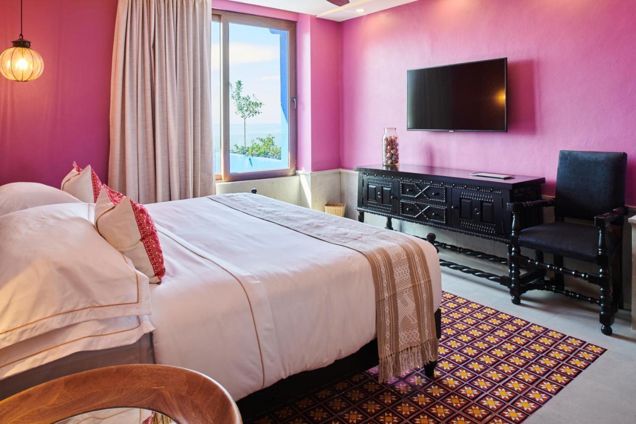 Hotel Luxury Patio Azul (Adults Only) ปูแอร์โตบาญาร์ตา ภายนอก รูปภาพ A bedroom at the hotel