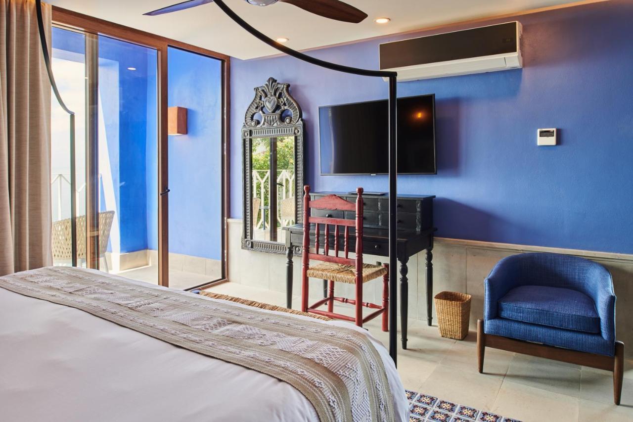 Hotel Luxury Patio Azul (Adults Only) ปูแอร์โตบาญาร์ตา ภายนอก รูปภาพ A room at the hotel