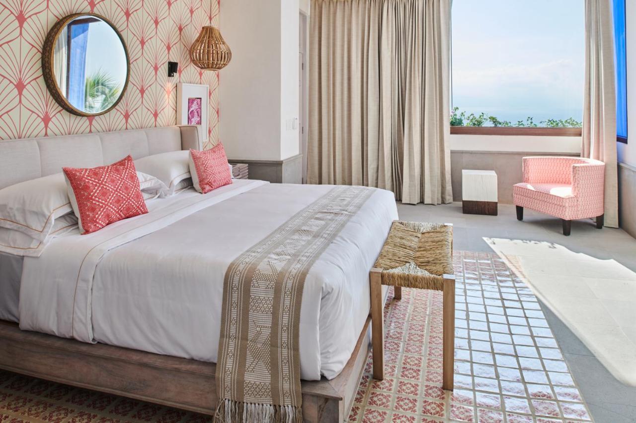 Hotel Luxury Patio Azul (Adults Only) ปูแอร์โตบาญาร์ตา ภายนอก รูปภาพ A bedroom at the hotel